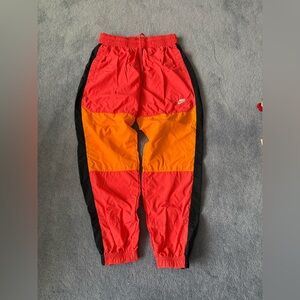 Nike NSW Sportswear Woven Zip Trackpants Coral Orange Black Mens M BV5387-850